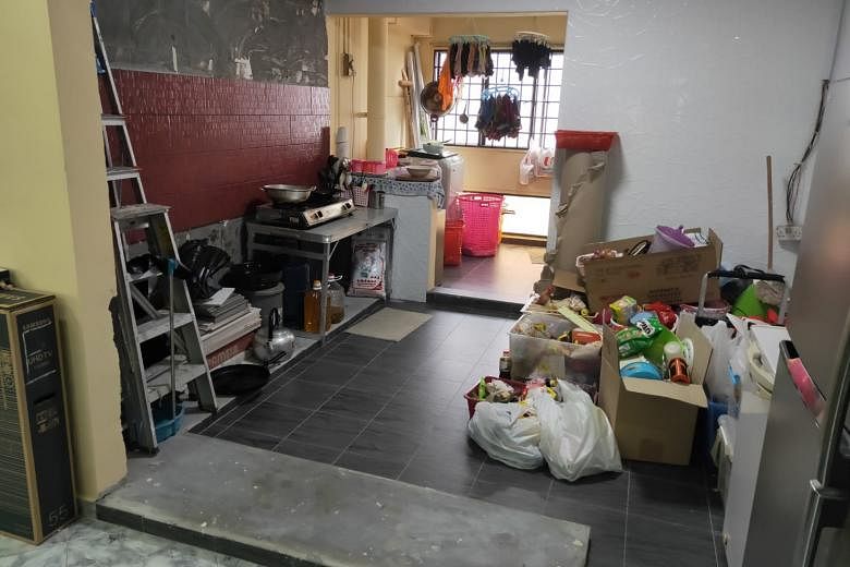 Housewife Nura Rashid's HDB flat in Woodlands is yet to be fully renovated as there is still work to be done to the kitchen (above) and the master bedroom toilet (below), for example. For the past two months, home renovation works have come to a halt