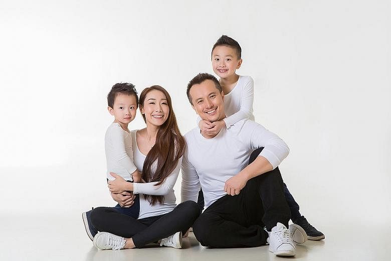 Children's author Robin Leong with his wife Kris Ruan and their two children, Brady (far left) and Lucas.