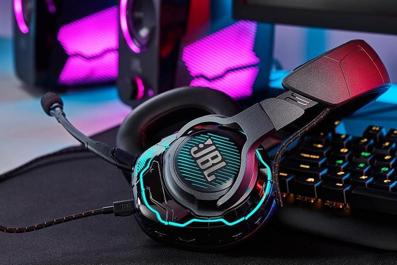 When powered up, the wired over-ear JBL Quantum One headset lights up with a cyberpunk glow, like something from a sci-fi movie.