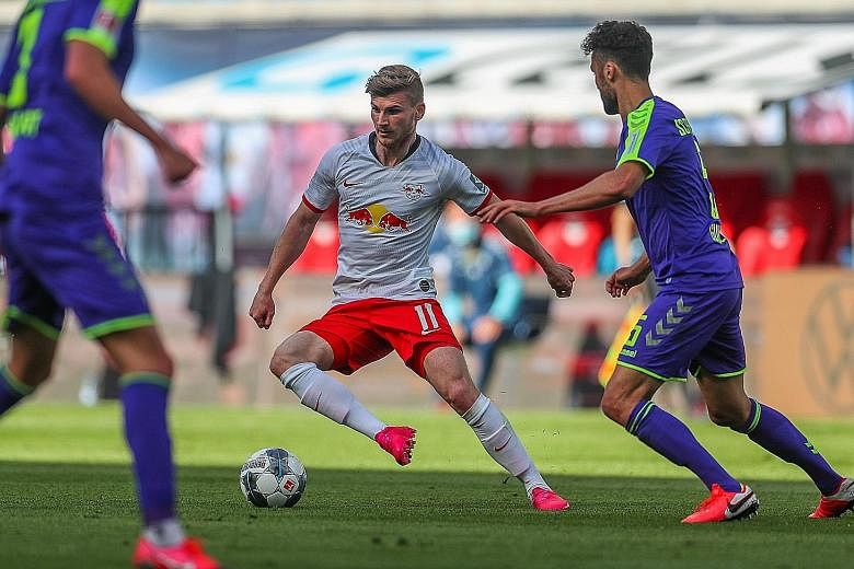 Leipzig striker Timo Werner taking on Freiburg in a Bundesliga game last month. He is set for a move to England next season, with reports revealing the Germany international has agreed terms with Premier League side Chelsea.
