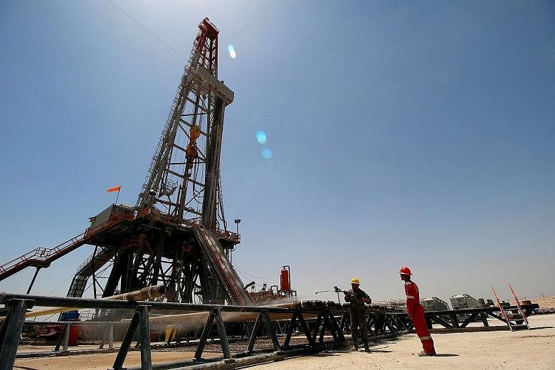 An oilfield in Iraq. After almost a week of wrangling, Russia and Saudi Arabia clinched a tentative deal with Iraq to comply with oil production curbs.
