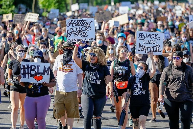 Thousands of protesters marching on Friday from downtown to the site of the arrest of black American George Floyd, who died while in police custody in Minneapolis, Minnesota.