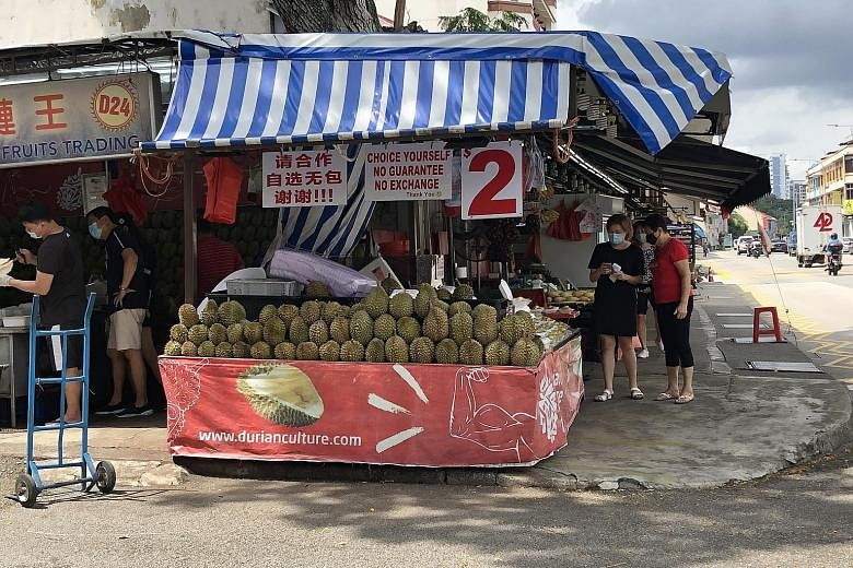 Stalls like Durian Culture in Sims Avenue no longer let buyers eat on their premises, which may lead to a drop in the number of customers.