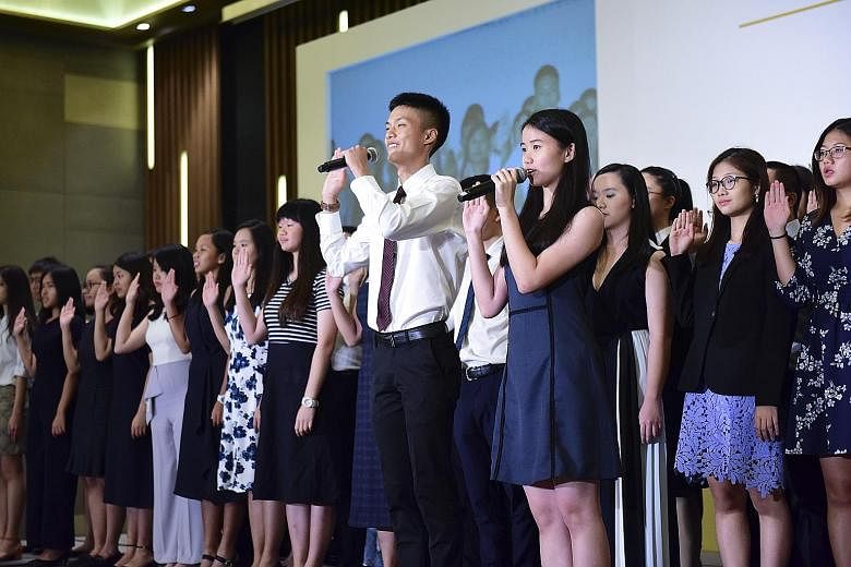 The Public Service Commission's Scholarships Award Ceremony last year. The PSC as well as major companies including OCBC Bank say that they will continue to consider candidates for the same number of scholarships as previous years.