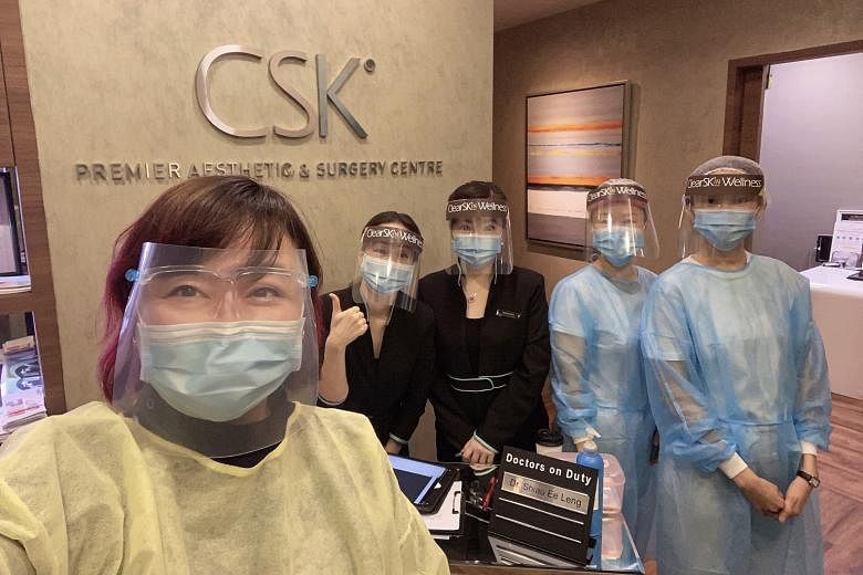 Dr Shiau Ee Leng (left) and staff from ClearSK Healthcare Group. Non-urgent aesthetic procedures have yet to receive the green light from the Ministry of Health even after the circuit breaker was lifted last Tuesday. PHOTO: SHIAU EE LENG