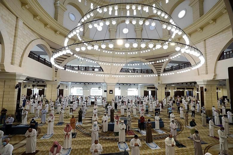 Muslims practising safe distancing while at Friday prayers last week at the Al-Rajhi Mosque in Riyadh. Saudi Arabia has seen coronavirus infections spike as it eases stringent lockdown measures.