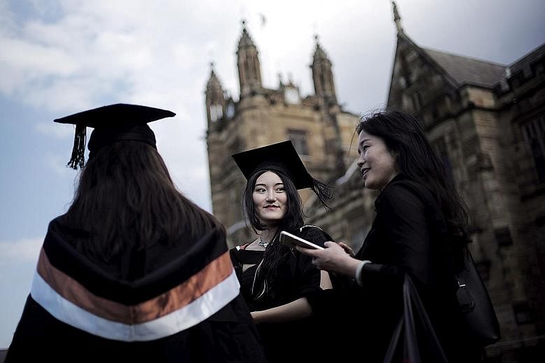 Students during a graduation ceremony at the University of Sydney in 2016. Australian universities are already facing massive losses as an indefinite coronavirus border closure locks out foreign students who pump billions of dollars a year into the s
