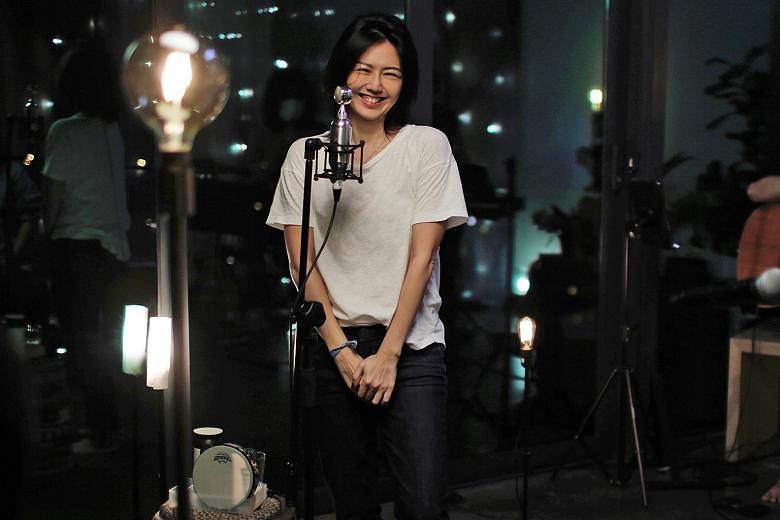 Singer Stefanie Sun (above) held a surprise online concert on Tuesday to mark the 20th anniversary of the release of her first album, Yan Zi (above left).