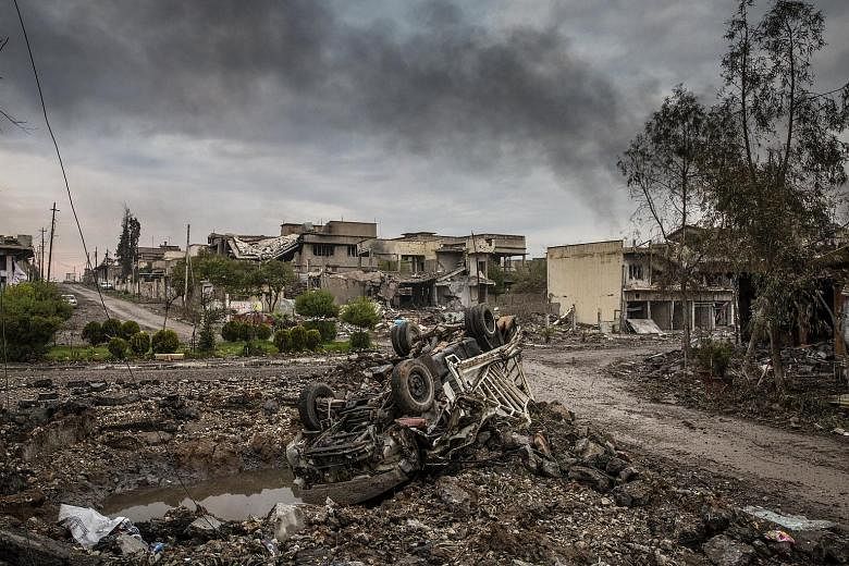 The aftermath of fierce fighting between Iraqi special forces and Islamic State in Iraq and Syria (ISIS) militants in Mosul, Iraq, in March 2017. Washington sees the US presence in Iraq as crucial for tamping down the resurgence of ISIS. PHOTO: NYTIM