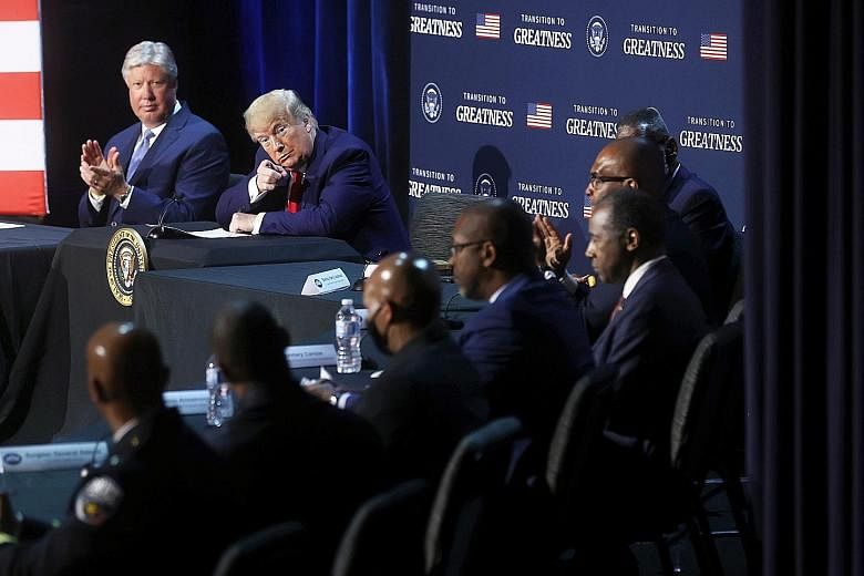 President Donald Trump during a roundtable discussion with religious leaders, business owners and law enforcement officials in Dallas on Thursday. He said he was working to finalise an executive order that called for encouraging "police departments n