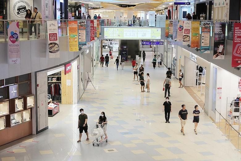 Shoppers at VivoCity a few days before the circuit breaker took effect in April. Singapore's first standard on e-commerce transactions will serve as a practical reference for e-retailers and e-marketplaces. It will also support Enterprise Singapore's