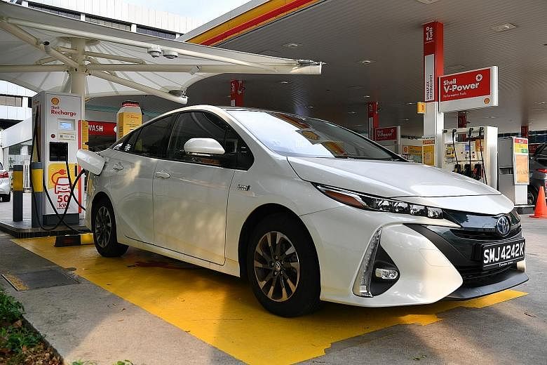 The Toyota Prius Plug-in Hybrid Vehicle can be charged at public charging points, such as those at Shell petrol stations (above), using a Shell Recharge RFID card. The digital display in the car indicates the amount of time needed to charge the car.