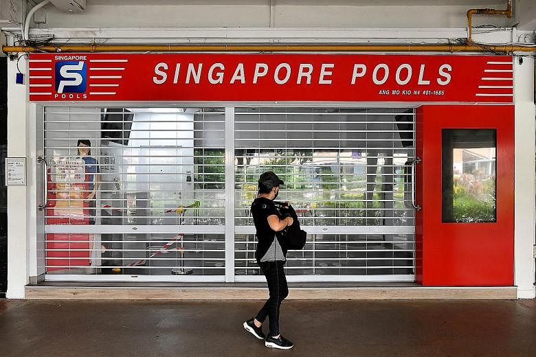 A Singapore Pools outlet in Ang Mo Kio Avenue 10 which has been closed amid circuit breaker curbs. To safeguard its customers, Singapore Pools actively monitors the Internet for phishing websites and fake apps that improperly use its brand, the local