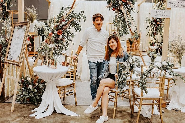 MS BELICIA TAN, co-founder of wedding florist and stylist Flora Artisan, who is prepared for her company to take on more small projects in the future, in a bid to try to make the same profit. With her in the photo is Flora Artisan creative director Jonath