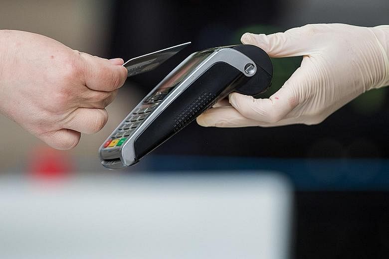 There are benefits in using credit cards from different providers, such as Visa or Mastercard, says the writer, as it allows the user to enjoy the discounts and promotions that different providers offer regularly. 
