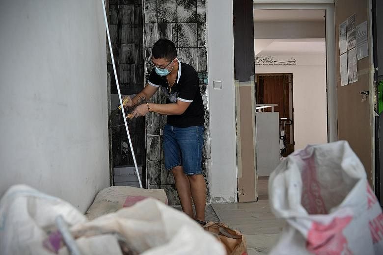 Renovation works at a resale flat in Segar Road, Bukit Panjang, on June 2. More than 19,000 suspended home renovation projects have received approval to resume since the circuit breaker period ended on June 1. ST PHOTO: NG SOR LUAN