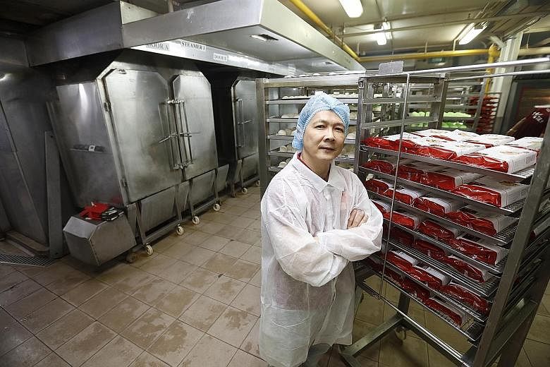 Mr Johnson Tay, director of operations at Sin Mui Heng Food Industries, in a 2019 file photo. The food manufacturer's management was quick to realise that the only source of income during the outbreak would be from direct consumers so it continued or