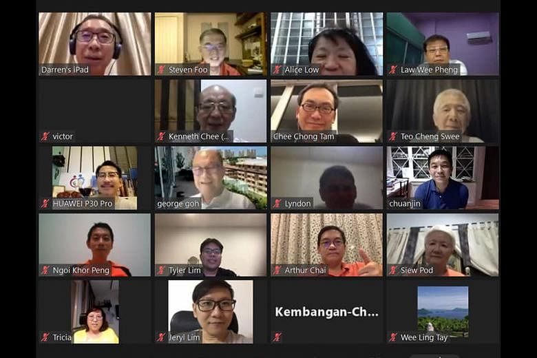 Parliament Speaker Tan Chuan-Jin (right), MP for Marine Parade GRC, holding an online meeting with community leaders in his ward. Weekly Meet-the-People Sessions have also switched to a remote format.