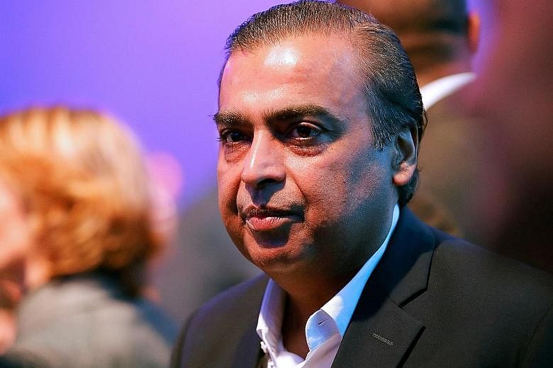Mr Mukesh Ambani (above), who launched online grocery business JioMart last month across 200 cities in India, will be competing against US firms such as Amazon and Flipkart. Retail analysts said his Reliance Industries, which owns Reliance Fresh stor