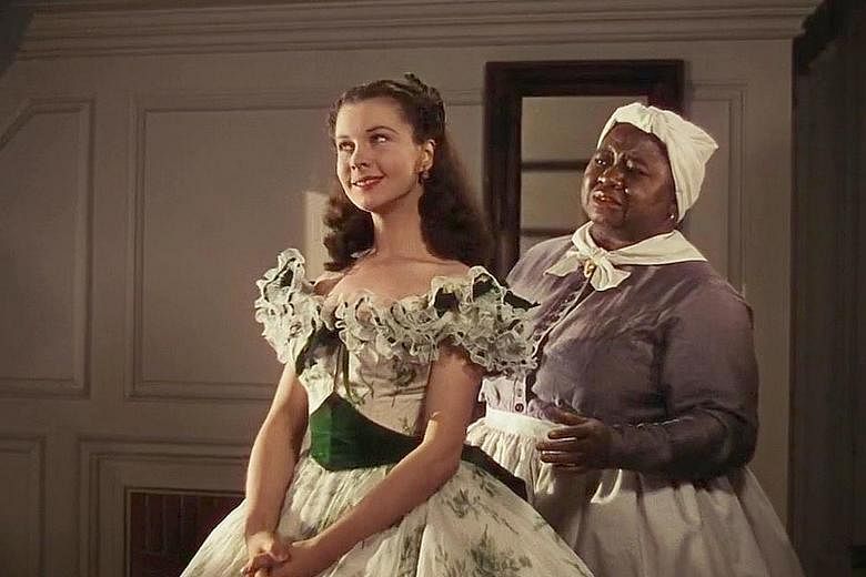 Gone With The Wind, which stars Vivien Leigh (left) and Hattie McDaniel (right), has been widely criticised for romanticising slavery.