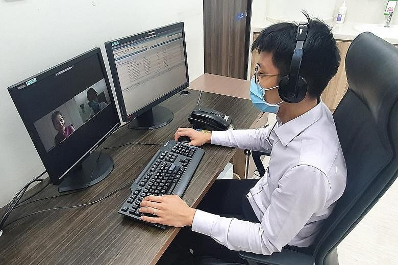 A doctor conducting a teleconsultation session at one of NHGP's polyclinics. PHOTO: NATIONAL HEALTHCARE GROUP POLYCLINICS