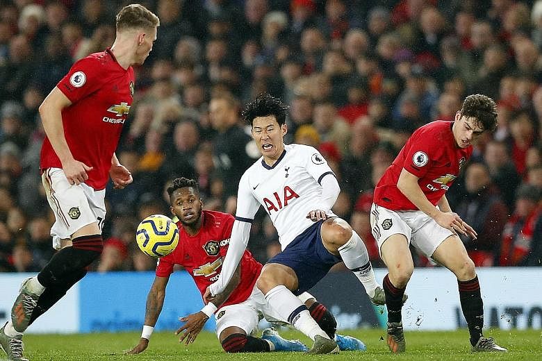 Spurs' Son Heung-min being tackled by Manchester United's Fred, as Scott McTominay and Daniel James close in during the two sides' last Premier League meeting. The super-fit South Korean could be even more of a handful today, after his tough three-we