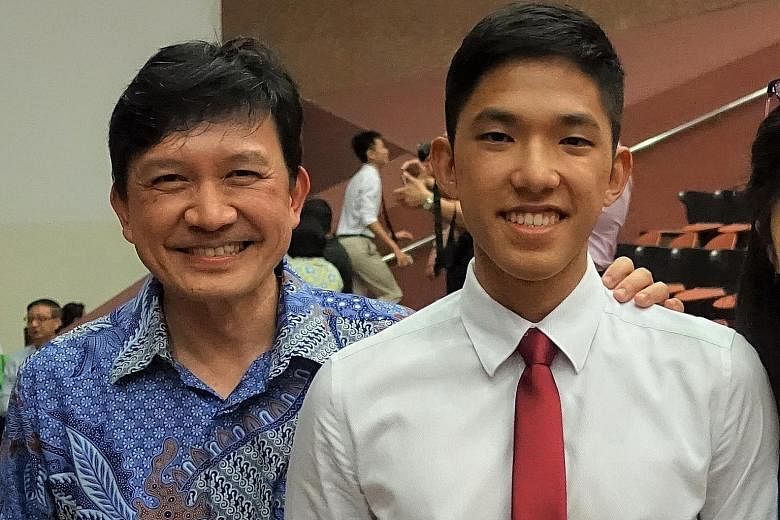 Dentist Tan Peng Hui, who rallied those in the dental industry to donate masks to nursing homes, with his son Caleb, a medical student who volunteered his help in the Covid-19 fight. PHOTO: COURTESY OF TAN PENG HUI