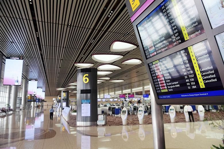 A nearly empty Changi Airport T4 due to cancelled flights in March. Case has urged airlines to offer cash refunds as it is unclear when widespread commercial travel could resume.
