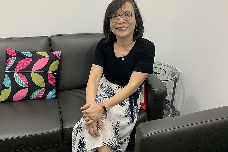 Ms Emily Ong, seen here at the Alzheimer's Disease Association in late March, was diagnosed with young onset dementia about two years ago at the age of 51. She said her diagnosis was a relief: "It helps you to better understand yourself. You don't ha