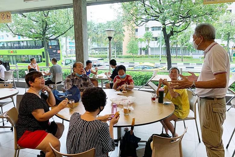 Senior Minister Teo Chee Hean chatting with residents at a coffee shop in his Pasir Ris ward yesterday. He had posted photos on Facebook and wished residents and stallholders good health. PHOTO: TEO CHEE HEAN/FACEBOOK