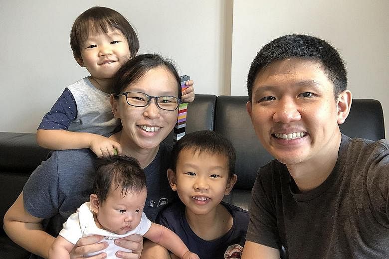 Mr James Ong and Ms Guo Siling with their three children - three-year-old Alethea, five-year-old Nathanael and baby Althea, who is 10 weeks old. Ms Guo says that when both parents are involved in taking care of the children, "you don't feel lonely be