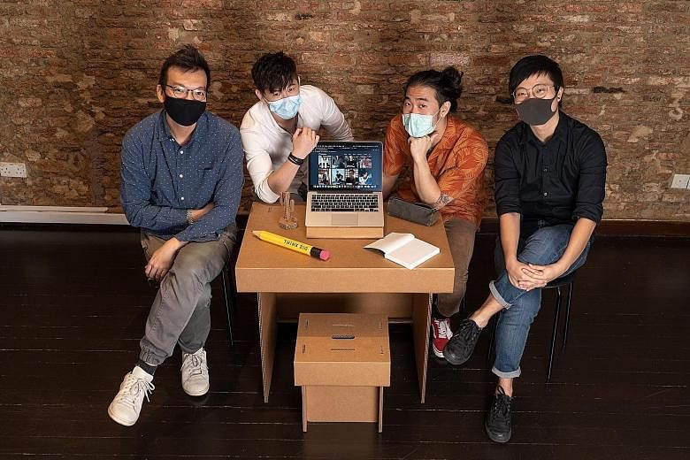 From left: Design director John Chan, design intern Scott Lee, content strategist Christian Sng, and experience and 3D designer Teo Kiah Sheng from strategic design consultancy Chemistry with the #HBLTable, which is made of sturdy double-wall cardboa