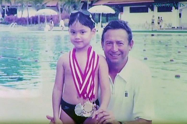 A young Joseph Schooling and his father Colin after a swimming meet in Singapore. With the support of his parents, the boy chased his dreams and made Olympic history. ST FILE PHOTO