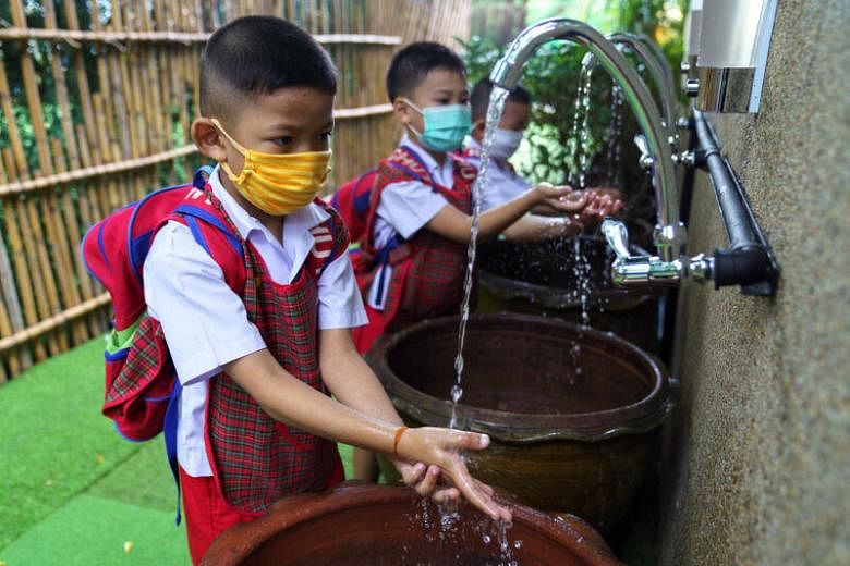 Babies in Thailand Given Face Shields to Protect Against Coronavirus