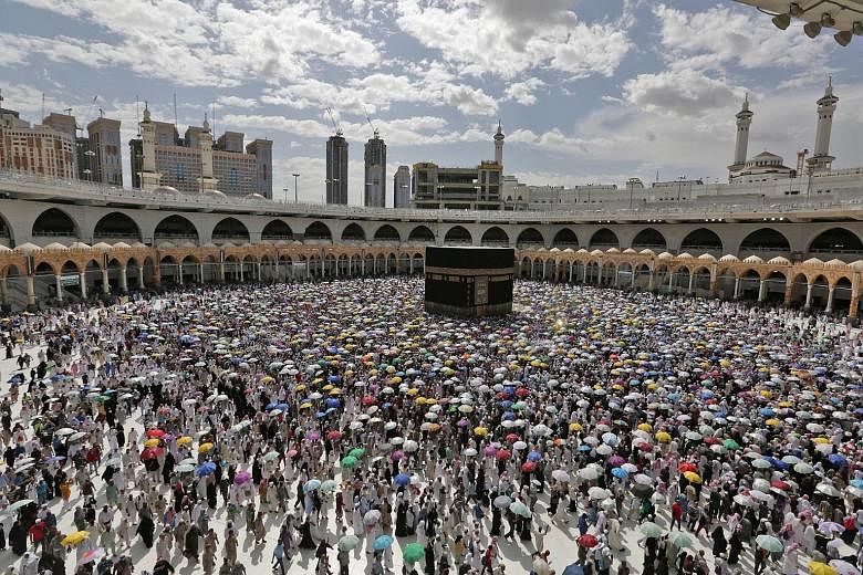 Muslim pilgrims circling the Kaaba last August in Mecca, Saudi Arabia. The haj ritual will be scaled back this year, due to the coronavirus, the kingdom said. PHOTO: EPA-EFE