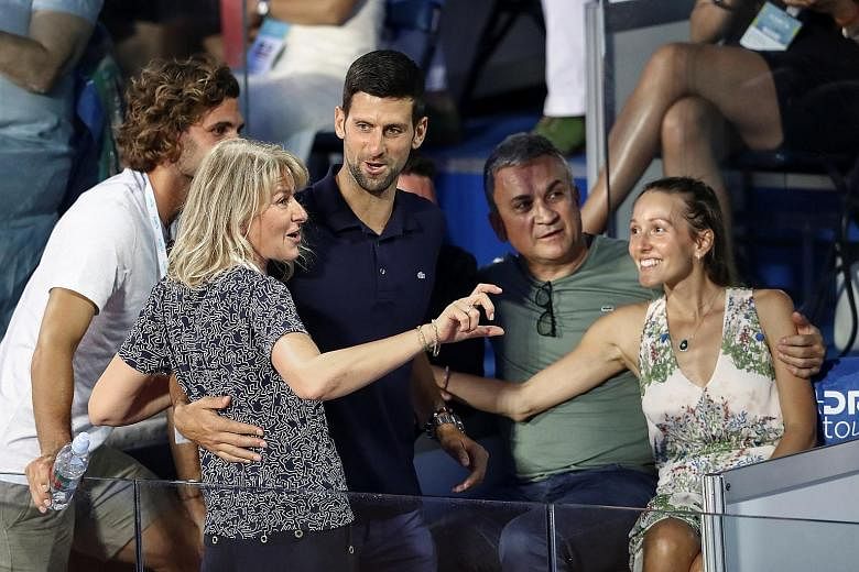 Novak Djokovic with (clockwise from front) his mother Dijana, brother Marko, father Srdjan and wife Jelena at the Adria Tour event in Belgrade on June 14. The event, which was organised by the world No. 1, was criticised for its lack of precautions a