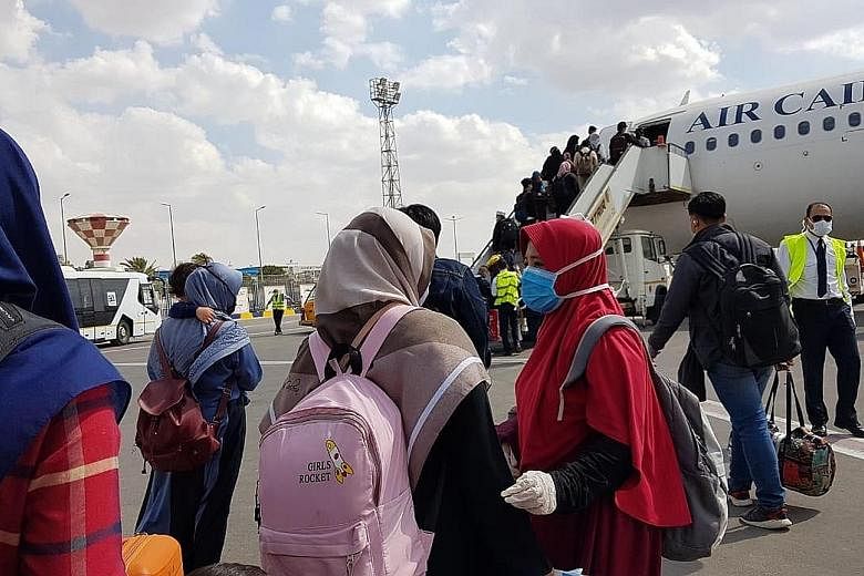Indonesians who have been stranded in Egypt board a special Air Cairo flight on Sunday to return to Indonesia because of the Covid-19 outbreak. Most of the nine million Indonesians working overseas are doing so illegally, making it tough to track the