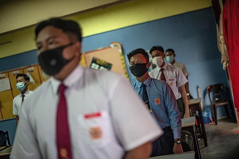 Classes in Malaysian schools resumed yesterday for more than 500,000 students in Secondary 5 and 6. The government will also allow Malaysians to organise and attend social events such as weddings and reunion gatherings from July 1.