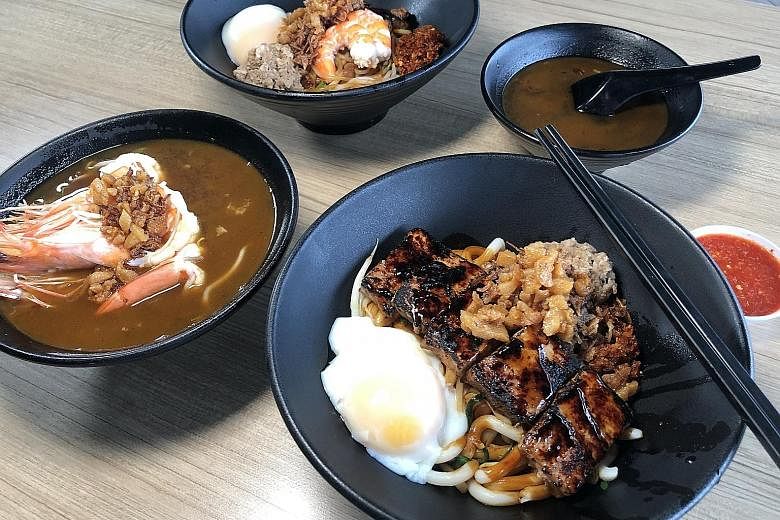 Kung Fu JB Pau offers an assortment of Johor Baru-style pau. The Special Prawn Noodles (top) and King Prawn Udon (far right) are served with hearty bowls of prawn broth. Clockwise from top left: Chee Cheong Fun, Cuttlefish Peanut Congee, Jellyfish an
