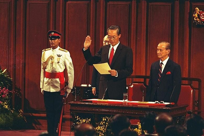 Left: Mr Goh Chok Tong celebrating his first electoral victory in the 1976 General Election. He was elected to represent Marine Parade, where he remained an MP throughout his political career. PHOTO: SIN CHEW Above: Mr Goh taking his oath at the swea