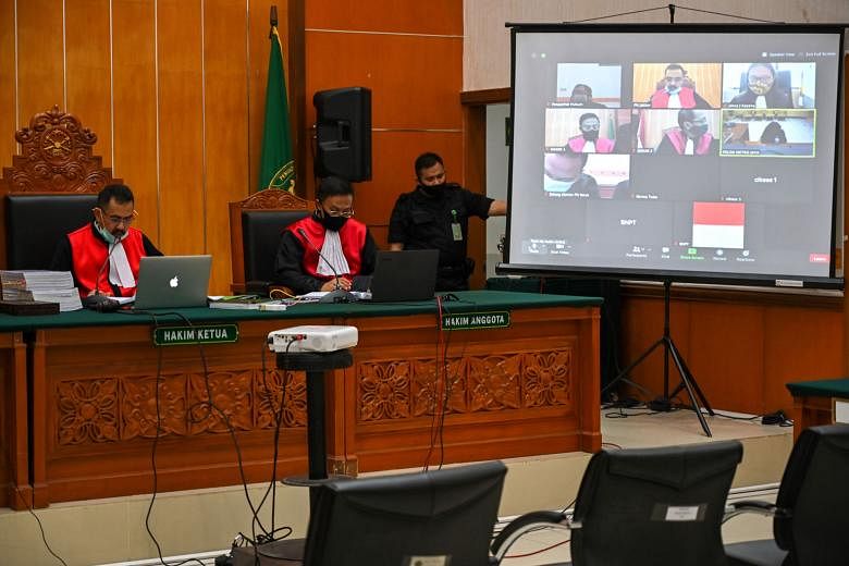 The trial of Syahrial Alamsyah and his wife Fitria Diana (both below) conducted over videoconference yesterday. The couple attacked then Security Minister Wiranto during his visit to Pandeglang regency on Java island last October. Alamsyah was jailed