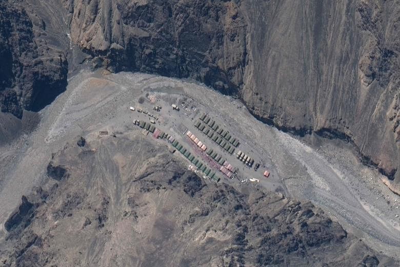 A satellite image taken last month showing a People's Liberation Army base in Galwan Valley. Indian and Chinese military commanders agreed this week to step back from a stand-off following a June 15 border clash, but fresh satellite images showing ne