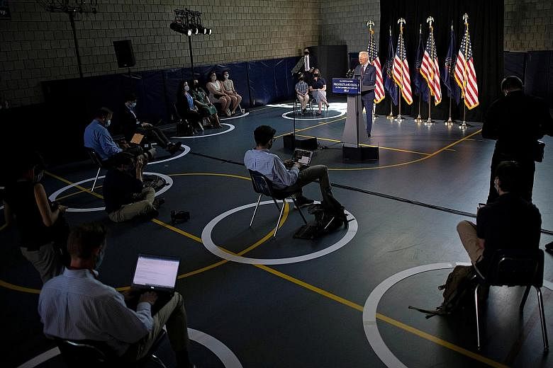 Journalists covering a campaign event on Thursday by Mr Joe Biden, at a gymnasium in Lancaster, Pennsylvania. PHOTO: REUTERS
