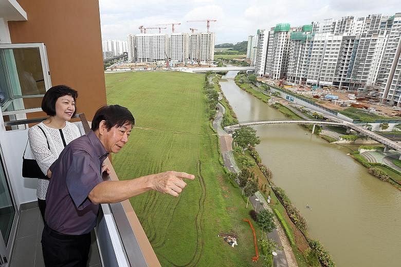 Mr Khaw Boon Wan previously served as national development minister when housing was a hot-button issue. He is seen here in a 2014 file photo with HDB CEO Cheong Koon Hean viewing the projects along Punggol Waterway. ST FILE PHOTO