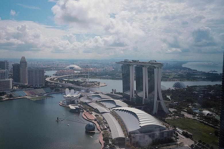 Singapore, the little red cork bobbing on the channel connecting the South China Sea and the Indian Ocean, faces complex external uncertainties as it goes into an election in times such as it has never seen before. ST PHOTO: JASON QUAH
