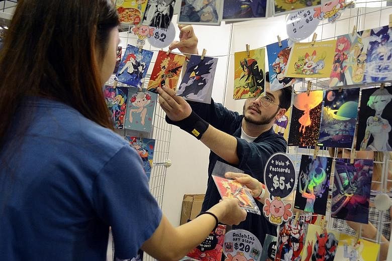 Mr Andrew Unwin, an illustrator and graphic artist, taking part in Doujima 2019 at the Suntec Singapore Convention and Exhibition Centre. This year's event was cancelled and the next edition will be held next May.