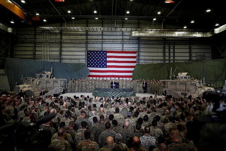 President Donald Trump speaking to US troops during a visit to Bagram Air Base in Afghanistan last November. The New York Times reported last Friday that a Russian military intelligence unit had secretly paid Taleban-linked militants to target coalit