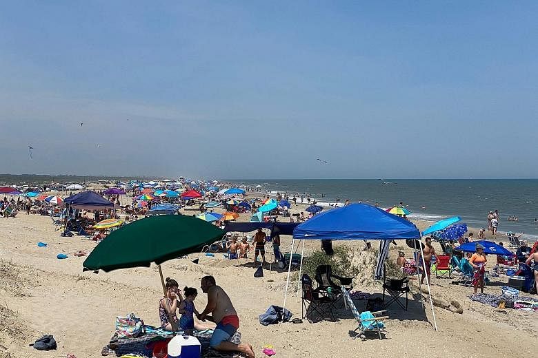 People at Chincoteague beach in Virginia last Saturday, amid a resurgence of the coronavirus outbreak in the US. In Florida, the Miami authorities have announced that beaches will be closed over the July 4 holiday weekend, normally one of the busiest