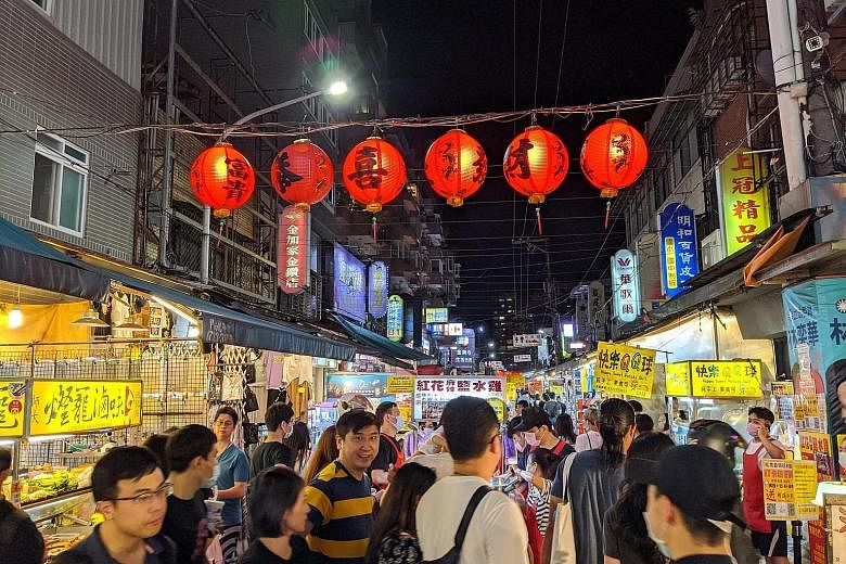 Taiwanese at the Tonghua Night Market in Taipei last month, amid the Covid-19 outbreak. After months of staying at home, people have turned to domestic travel and outdoor sports with a vengeance. While business has picked up slightly since last month