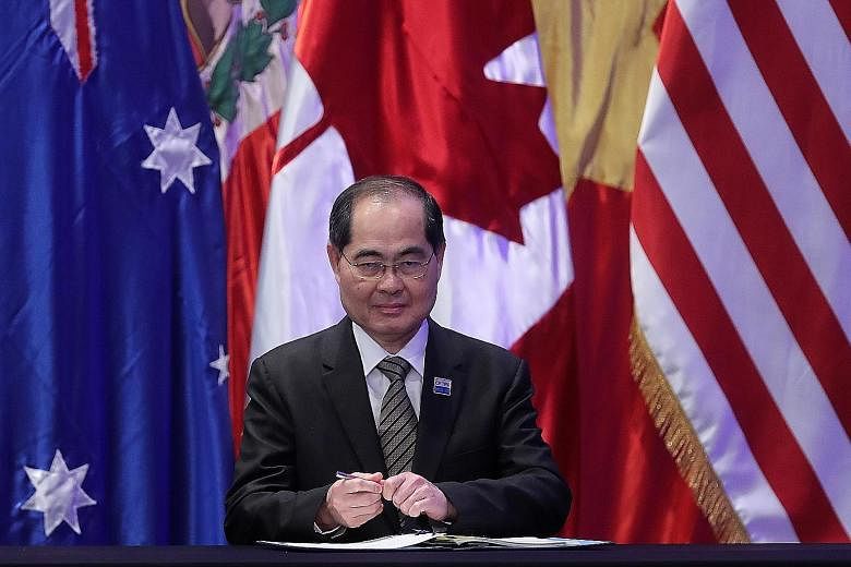 Trade and Industry Minister Lim Hng Kiang signing the Comprehensive and Progressive Agreement for Trans-Pacific Partnership in Santiago, Chile, in March 2018.